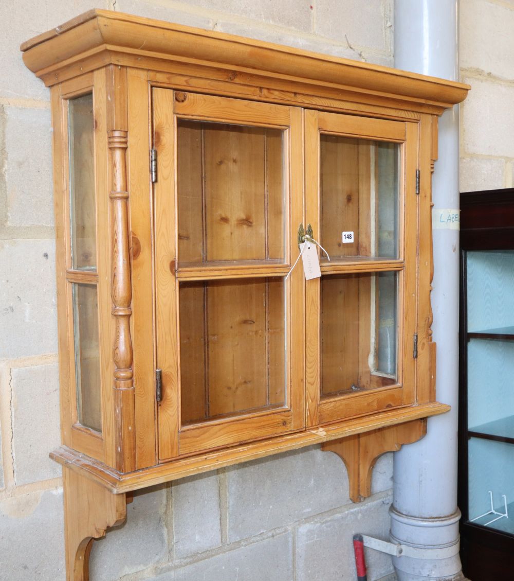 A pine wall cabinet, W.91cm